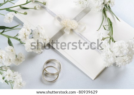 Wedding invitation, romantic background with delicate Perry\'s White flowers.