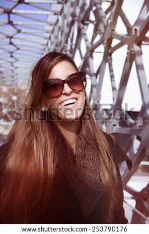 Beautiful young woman in her heart sunglasses vintage, outdoor, fashion, portrait. / University  /Beautiful young woman in her heart sunglasses vintage, outdoor, fashion, portrait.