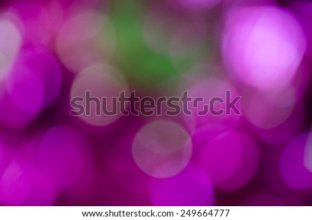 de-focused lights background. abstract Bokeh purple and green lights