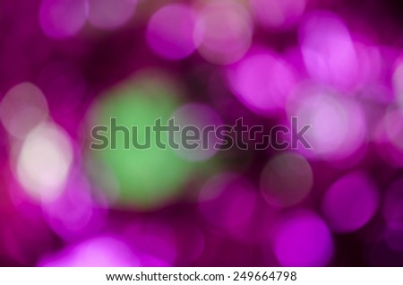 de-focused lights background. abstract Bokeh purple and green lights
