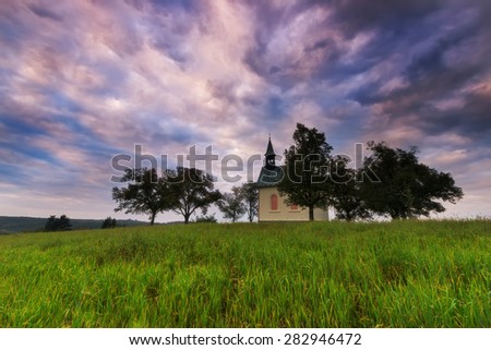 Church on a hill in a field under a cloudy sky, Brno, Czech Republic