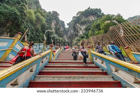 Kuala Lumpur,Malaysia - August 3, 2014:People can seen exploring,climbing up and down to the Batu Caves Kuala Lumpur.