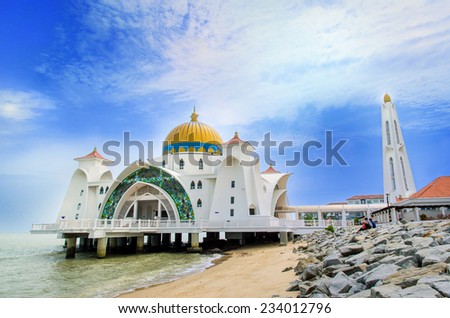 Malacca,Malaysia - June 15, 2014 : Malacca Straits Mosque is also known as Malacca\'s floating mosque as it is built on stilts above the sea,it looks like floating structure if the water level is high.