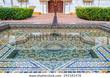 Selangor, Malaysia- October 5, 2014: A beautiful pool decorated with marbles and mosaic, which is Moroccan architecture located at Moroccan Pavilion in Putrajaya Malaysia.