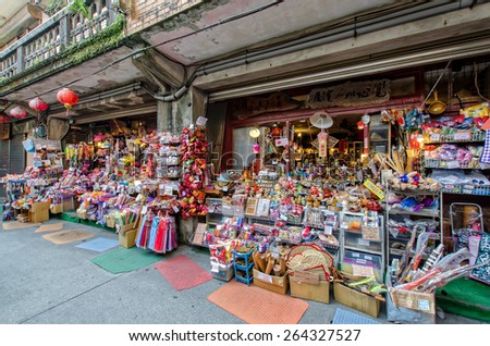 Jiufen,Taiwan - March 18,2015 : The shops in Jiufen Old Street are vending the most famous country snack of Jiufen, and various local accessories.