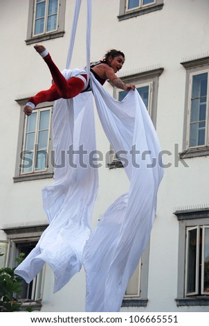 LJUBLJANA, SLOVENIA - JUNE 30:  Theaker von Ziarno, acrobat on ropes, aerial artist  from Australia, at traditional street theater festival Ana Desetnica on June 30, 2012 in Ljubljana, Slovenia.