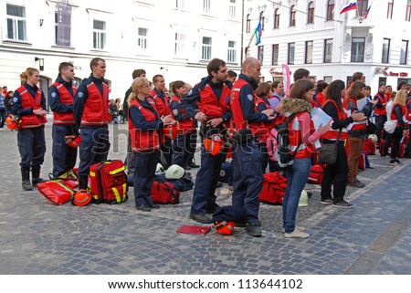 LJUBLJANA, SLOVENIA - SEPTEMBER 15: Teams ready for instructive exercise on World First Aid Day. Association of the Red Cross and the Municipality of Ljubljana. September 15, 2012, in Ljubljana, SI.
