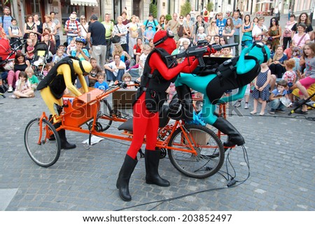 LJUBLJANA, SLOVENIA - JULY 2, 2014: Teatr Brovi from Ukraine with their performance  Colored Men at traditional street theater Ana Desetnica. Story reflects the current situation in Ukraine.