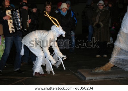 LJUBLJANA, SLOVENIA - DECEMBER 30: Kansky, a group of Slovene students from the street theater school called Sugla, perform the legend of a white Goldhorn Chamois at  the Ana Mraz Theatre Festival on December 30, 2010 in Ljubljana, Slovenia.