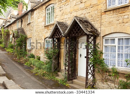 A row of stone cottages in the cotswolds, England