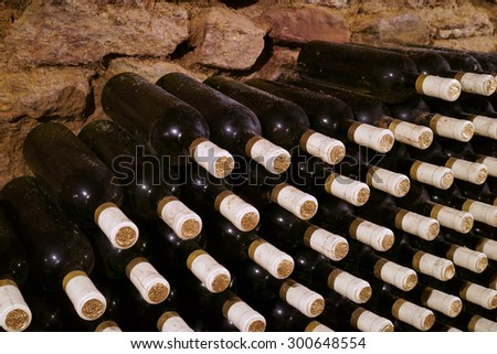 bottles of wine in the wine cellar lying horizontally