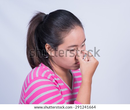 Portrait of young woman have a sore eyes.