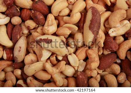 A variety of fresh mixed nuts closeup