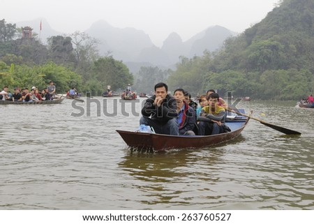 Hanoi, Vietnam, March 15, 2015: Boat on the way to go to the Huong Pagoda. HUONG Pagoda Festival is the biggest and longest annual festival in VIETNAM
