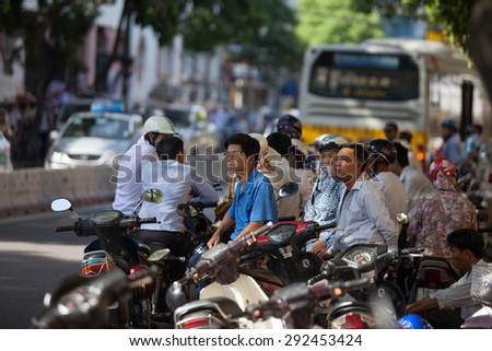 Hanoi, Vietnam, July 1 :Starting university exams in Vietnam. parents and families of students are waiting outside the school gates contestants July 1, 2015