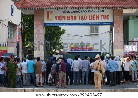 Hanoi, Vietnam, July 1 :Starting university exams in Vietnam. parents and families of students are waiting outside the school gates contestants July 1, 2015