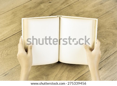 hand open book for reading concept background