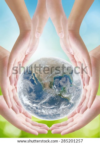 Hand holding earth on nature background ,concept background , Elements of image are furnished by NASA