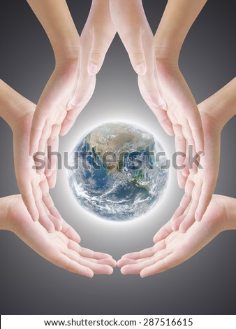 Hand make drop water shape  holding earth on nature background ,concept background , Elements of image are furnished by NASA