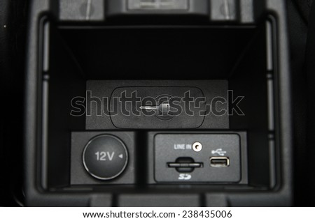 USB dock with charging cable on a car