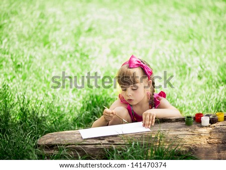 children draw out of door in park