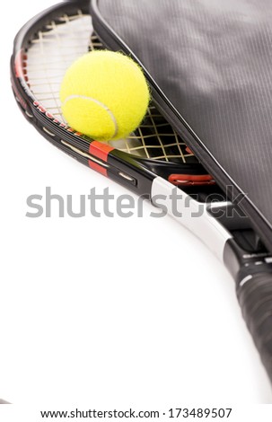 tennis ball and racket on a white background with copy space