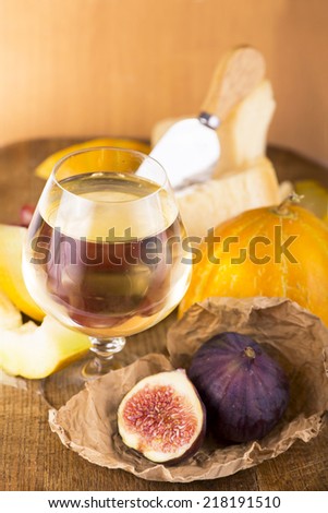 fig, cheese, melon and white dry wine