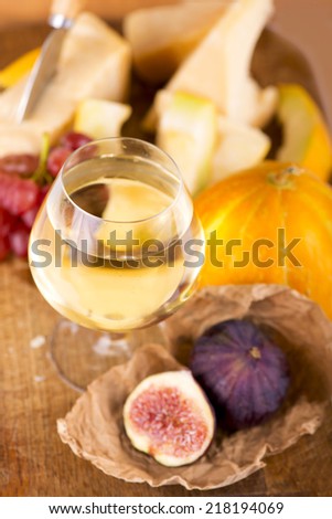 cheese, melon, fig and white dry wine