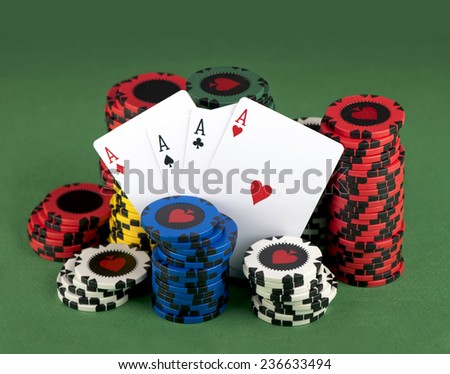 Poker Chips on a green gaming table