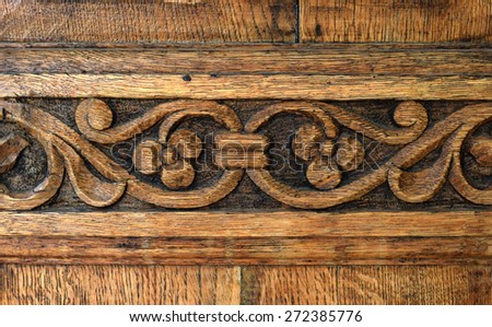 traditional door panel carved in wood at the old monastery