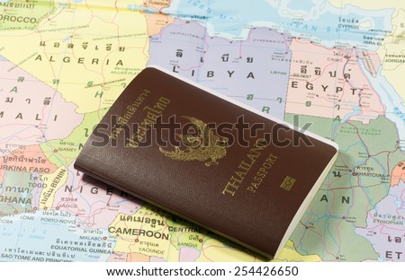 Thailand Passports on a map of the Algeria, Libya and Egypt.