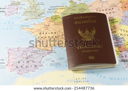 Thailand Passports on a map of the France, Spain,Andorra  and Portugal.