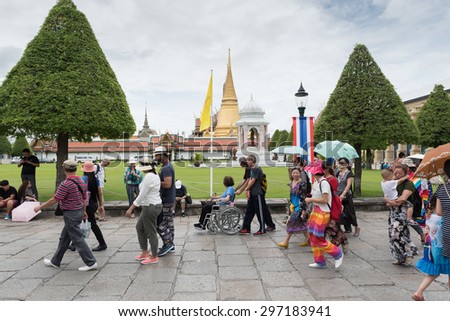 BANGKOK, THAILAND - Jul  17, 2015: Tourists visit the Grand Palace in Bangkok, Thailand on July  17 2015. Grand Palace in Bangkok is the most famous temple and landmark of Thailand.