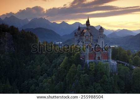 Beautiful evening view of the fairy tale Neuschwanstein castle, with autumn colours during sunset, Bavarian Alps, Bavaria, Germany