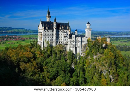 Famous fairy tale Neuschwanstein Castle in Bavaria, Germany, afternoon with blue sky