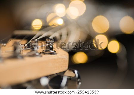 Guitar frets with strings and lights