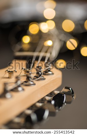 Guitar frets with strings and lights