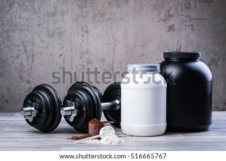 Classic black dumbbells with two protein jars