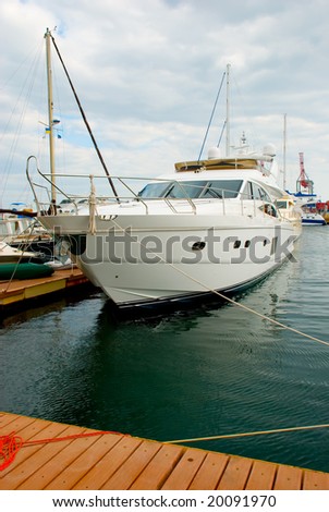 The white yacht anchored in harbor. Please see some similar pictures from my portfolio