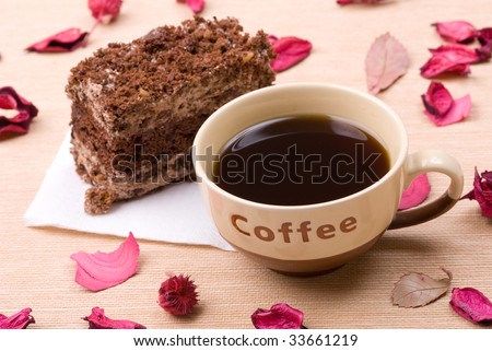 Cafeneaua vesela  2 - Pagina 21 Stock-photo-biscuit-cake-with-cup-of-coffee-in-petals-33661219