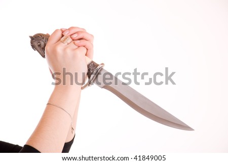 Knife in hand ready to stab