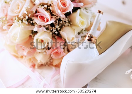 stock photo Wedding background from rings bouquet and white shoes bridge