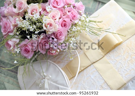 stock photo Wedding bouquet of roses bag and elegant box with bow