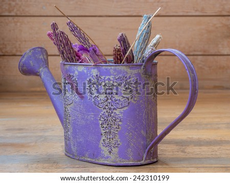 Violet watering can with lavender theme