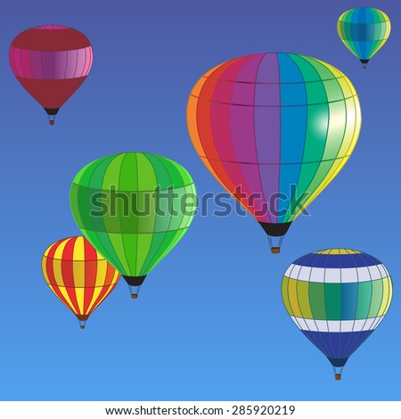 multicolored hot air balloons fly in the blue sky