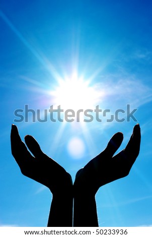 Hands and sun. Conceptual design.