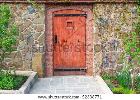 Red door of home. Exterior design.