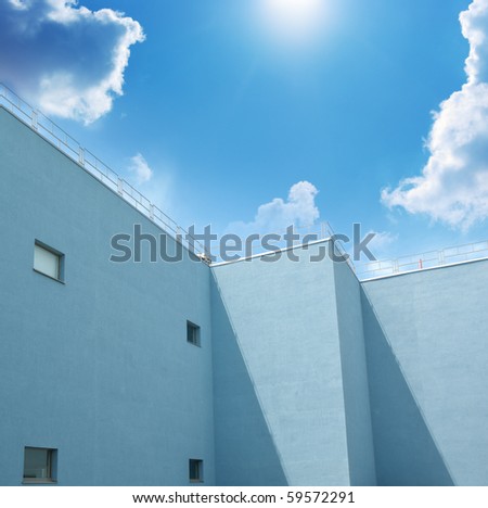 Building and blue sky. Element of design.