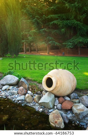 Big pitcher on river. Nature design.