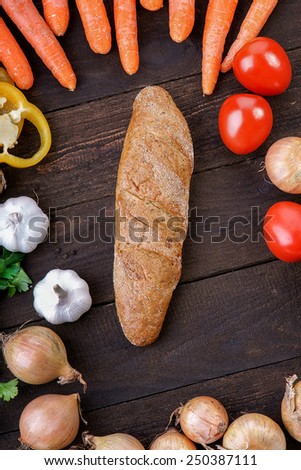 Vegetables mix on the table with bread